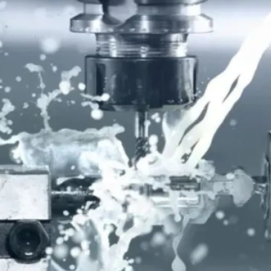 CNC milling operation with coolant spray